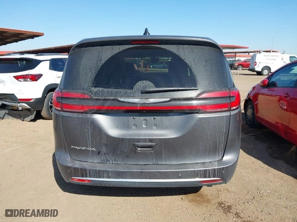 2023 Chrysler Pacifica Touring L with VIN 2C4RC1BG6PR547837, listed as a IAAI auction lot 42014739 with 59,943 mi miles. Bid and sale history available at carsss.com. Image 16.