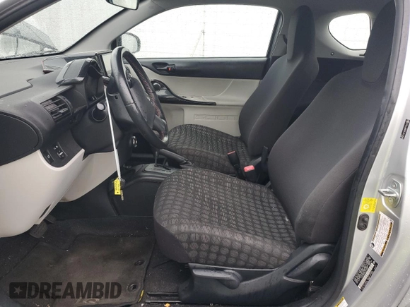 2012 Scion iQ z VIN JTNJJXB08CJ012348, wystawiony jako Copart lot #45415315 z przebiegiem 87 315 mil mil oraz Szkoda całkowita • Salvage title. Historia ofert i sprzedaży dostępna na DreamBid. Obrazek 7.