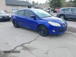 2014 Ford Focus SE with VIN 1FADP3F21EL314534, listed as a IAAI auction lot 42130032 with 103,866 mi miles. Bid and sale history available at carsss.com. Image 1.