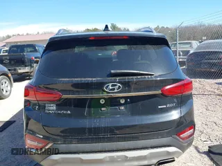 2019 Hyundai Santa Fe Ultimate with VIN 5NMS5CAA6KH075047, listed as a IAAI auction lot 41802407 with 119,063 mi miles and . Bid and sale history available at DreamBid. Image 16.