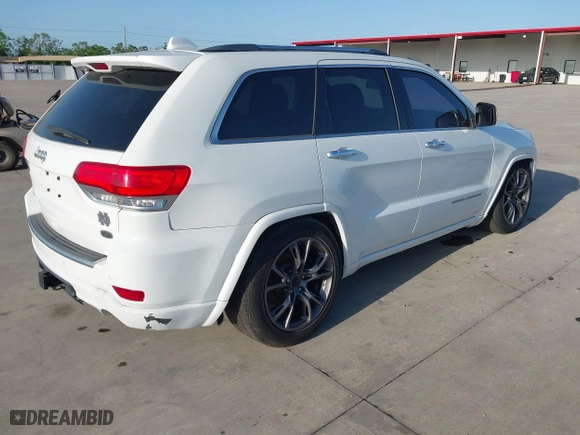 2014 Jeep Grand Cherokee Overland with VIN 1C4RJFCG6EC579985, listed as a IAAI auction lot 42025215 with 126,761 mi miles. Bid and sale history available at carsss.com. Image 4.