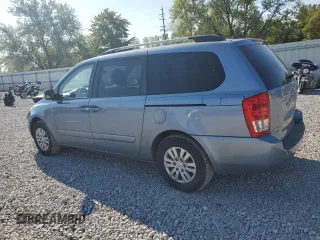 2012 Kia Sedona LX with VIN KNDMG4C70C6447748, listed as a Copart auction lot 71377294 with 146,057 mi miles and Salvage Title. Bid and sale history available at carsss.com. Image 2.