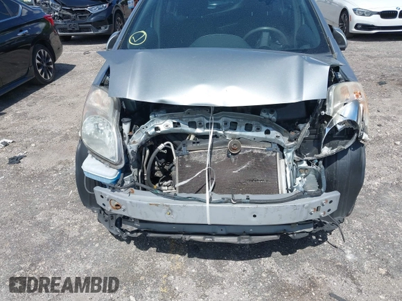 2010 Toyota Yaris with VIN JTDKT4K31A5318793, listed as a IAAI auction lot 39910045 with 192,737 mi miles. Bid and sale history available at carsss.com. Image 6.
