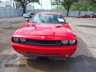 2009 Dodge Challenger R/T z VIN 2B3LJ54T89H588042, wystawiony jako IAAI lot #42122055 z przebiegiem Nie podano mil oraz . Historia ofert i sprzedaży dostępna na DreamBid. Obrazek 11.