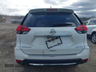 2017 Nissan Rogue S with VIN JN8AT2MVXHW017964, listed as a IAAI auction lot 41869965 with 123,544 mi miles and . Bid and sale history available at DreamBid. Image 17.