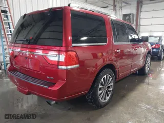 2015 Lincoln Navigator with VIN 5LMJJ2JT5FEJ11296, listed as a IAAI auction lot 41233028 with 189,509 mi miles. Bid and sale history available at carsss.com. Image 4.
