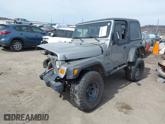 2002 Jeep Wrangler X with VIN 1J4FA39S82P707610, listed as a IAAI auction lot 41709953 with 1 mi miles. Bid and sale history available at carsss.com. Image 2.