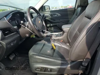 2020 Chevrolet Traverse Premier z VIN 1GNERKKW3LJ291107, wystawiony jako Copart lot #56363315 z przebiegiem 74 464 mil mil oraz Szkoda całkowita • Salvage title. Historia ofert i sprzedaży dostępna na DreamBid. Obrazek 7.