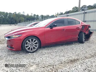 2021 Mazda 3 Select with VIN JM1BPABL3M1342706, listed as a Copart auction lot 73791724 with 27,233 mi miles and Salvage title. Bid and sale history available at DreamBid. Image 1.