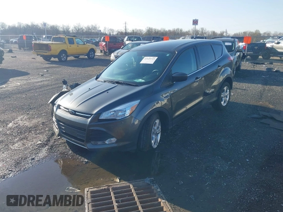 2016 Ford Escape SE with VIN 1FMCU9GX1GUB67636, listed as a IAAI auction lot 41929725 with 68,297 mi miles. Bid and sale history available at carsss.com. Image 2.