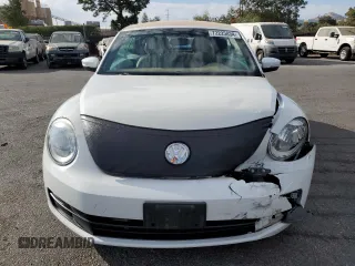 2015 Volkswagen Beetle 1.8T with VIN 3VW517AT6FM802771, listed as a Copart auction lot 72225834 with 128,946 mi miles and Salvage title. Bid and sale history available at DreamBid. Image 5.