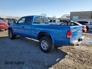 2001 Dodge Dakota SLT with VIN 1B7GG22X01S283618, listed as a Copart auction lot 42608555 with 142,307 mi miles and Salvage Title. Bid and sale history available at DreamBid. Image 2.