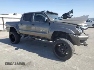 2015 Toyota Tacoma PreRunner with VIN 3TMJU4GN9FM187570, listed as a Copart auction lot 54339785 with Not provided miles and Salvage title. Bid and sale history available at DreamBid. Image 4.
