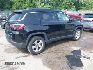 2018 Jeep Compass Latitude with VIN 3C4NJDBB2JT114644, listed as a IAAI auction lot 42499210 with 82,988 mi miles and . Bid and sale history available at DreamBid. Image 4.