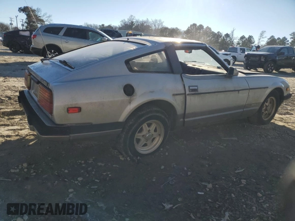 1983 Datsun 280ZX z VIN JN1HZ04S6DX571982, wystawiony jako Copart lot #86317294 z przebiegiem Nie podano mil oraz Tytuł czysty. Historia ofert i sprzedaży dostępna na DreamBid. Obrazek 3.