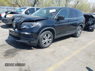 2016 Honda Pilot EX-L z VIN 5FNYF6H51GB125217, wystawiony jako IAAI lot #41993736 z przebiegiem 113 267 mil mil oraz . Historia ofert i sprzedaży dostępna na DreamBid. Obrazek 17.