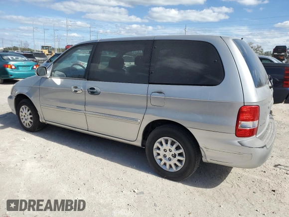 2003 Kia Sedona LX with VIN KNDUP131236453481, listed as a Copart auction lot 75660244 with 125,628 mi miles and Salvage Title. Bid and sale history available at carsss.com. Image 2.