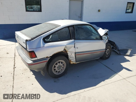 1987 Honda Civic z VIN JHMEC1327HS029350, wystawiony jako Copart lot #71452054 z przebiegiem 356 810 mil mil oraz Szkoda całkowita • Salvage title. Historia ofert i sprzedaży dostępna na DreamBid. Obrazek 3.