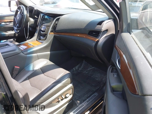 2020 Cadillac Escalade Luxury with VIN 1GYS3BKJ0LR129965, listed as a IAAI auction lot 42084752 with 133,390 mi miles and . Bid and sale history available at DreamBid. Image 5.
