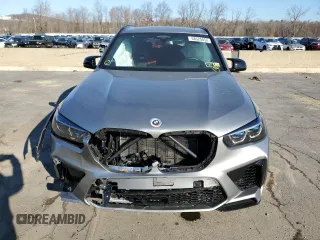 2022 BMW X5 M z VIN 5YMJU0C00N9M65330, wystawiony jako Copart lot #68525852 z przebiegiem Nie podano mil oraz . Historia ofert i sprzedaży dostępna na DreamBid. Obrazek 5.