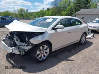 2012 Buick LaCrosse Premium 1 z VIN 1G4GD5E34CF130301, wystawiony jako IAAI lot #42205574 z przebiegiem 117 941 mil mil oraz . Historia ofert i sprzedaży dostępna na DreamBid. Obrazek 2.