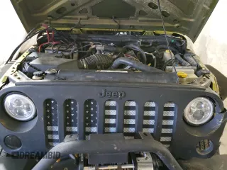 2007 Jeep Wrangler Unlimited X with VIN 1J4GA39187L190061, listed as a Copart auction lot 52420685 with 217,346 mi miles and Salvage Title. Bid and sale history available at DreamBid. Image 12.