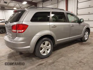 2015 Dodge Journey American Value z VIN 3C4PDCAB9FT675474, wystawiony jako IAAI lot #42078053 z przebiegiem 172 367 mil mil oraz . Historia ofert i sprzedaży dostępna na DreamBid. Obrazek 4.