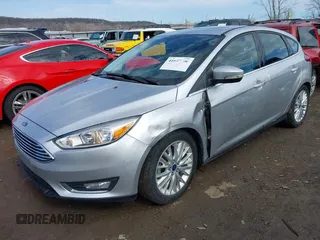 2017 Ford Focus Titanium with VIN 1FADP3N26HL309903, listed as a IAAI auction lot 41642306 with 107,762 mi miles and . Bid and sale history available at carsss.com. Image 17.