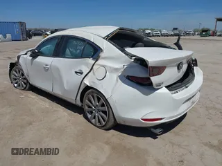 2021 Mazda 3 Select with VIN JM1BPABL0M1333705, listed as a IAAI auction lot 41819213 with 82,977 mi miles and . Bid and sale history available at DreamBid. Image 3.