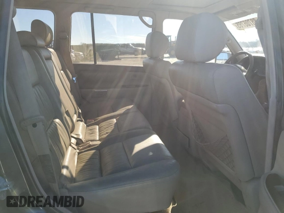 2002 Toyota Land Cruiser z VIN JTEHT05J122024015, wystawiony jako Copart lot #88706765 z przebiegiem Nie podano mil oraz Czysty tytuł • Clean title. Historia ofert i sprzedaży dostępna na DreamBid. Obrazek 10.