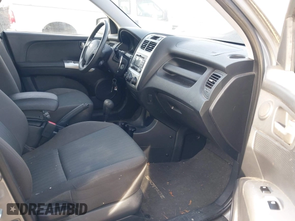 2010 Kia Sportage LX with VIN KNDKGCA36A7710107, listed as a IAAI auction lot 41846066 with 144,662 mi miles and . Bid and sale history available at carsss.com. Image 5.