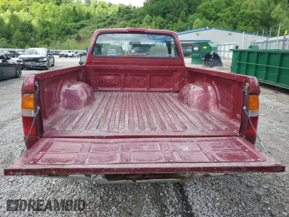 1999 Toyota Tacoma z VIN 4TANL42N4XZ435246, wystawiony jako Copart lot #56843025 z przebiegiem 197 295 mil mil oraz Szkoda całkowita • Salvage title. Historia ofert i sprzedaży dostępna na DreamBid. Obrazek 10.