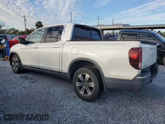 2019 Honda Ridgeline RTL-T with VIN 5FPYK2F63KB002874, listed as a Copart auction lot 42230235 with 127,158 mi miles and Non repairable. Bid and sale history available at DreamBid. Image 2.