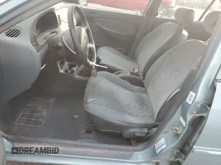 1998 Ford Escort SE with VIN 1FAFP13P5WW204650, listed as a Copart auction lot 85302484 with 95,586 mi miles and Salvage Title. Bid and sale history available at carsss.com. Image 7.