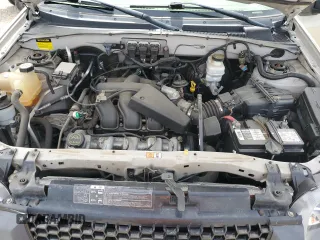 2005 Ford Escape XLT with VIN 1FMYU03165KC03784, listed as a Copart auction lot 64299225 with 185,033 mi miles and Salvage title. Bid and sale history available at DreamBid. Image 12.