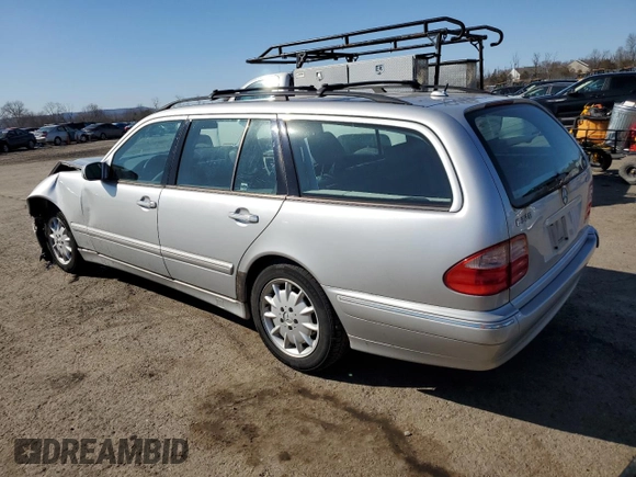 2001 Mercedes-Benz E-Class AWD with VIN WDBJH82J11X056425, listed as a Copart auction lot 48612975 with 130,900 mi miles and Salvage Title. Bid and sale history available at carsss.com. Image 2.