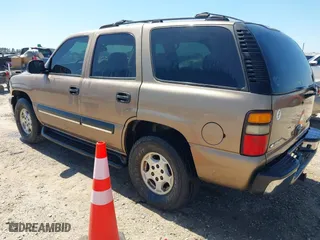 2004 Chevrolet Tahoe LT with VIN 1GNEC13Z04R118619, listed as a IAAI auction lot 42037638 with 234,472 mi miles. Bid and sale history available at carsss.com. Image 3.