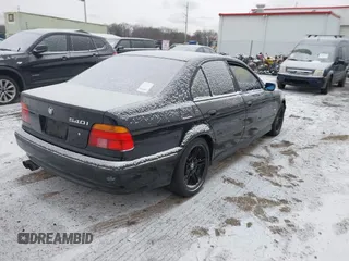 2000 BMW 5 Series 540i with VIN WBADN5340YGC94324, listed as a IAAI auction lot 41584964 with Not Provided miles. Bid and sale history available at carsss.com. Image 4.