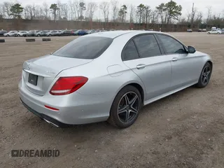 2018 Mercedes-Benz E with VIN WDDZF4KBXJA437064, listed as a IAAI auction lot 41902236 with 47,657 mi miles. Bid and sale history available at carsss.com. Image 4.