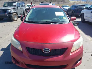 2009 Toyota Corolla with VIN 2T1BU40E19C105746, listed as a IAAI auction lot 41964481 with 261,136 mi miles. Bid and sale history available at carsss.com. Image 12.