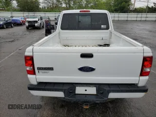 2011 Ford Ranger XLT with VIN 1FTLR4EEXBPA89648, listed as a Copart auction lot 54789615 with 106,630 mi miles and Salvage title. Bid and sale history available at DreamBid. Image 6.