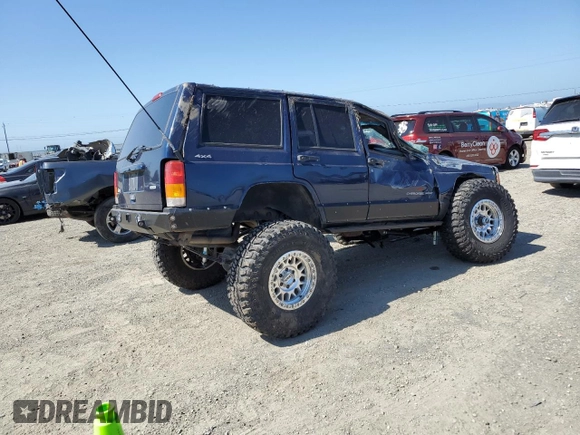 2000 Jeep Cherokee with VIN 1J4FF48S3YL126931, listed as a Copart auction lot 57593305 with Not provided miles and Non repairable. Bid and sale history available at DreamBid. Image 3.