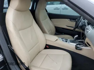 2012 BMW Z4 sDrive28i with VIN WBALL5C56CE716558, listed as a Copart auction lot 62003125 with 93,438 mi miles and Salvage title. Bid and sale history available at DreamBid. Image 10.
