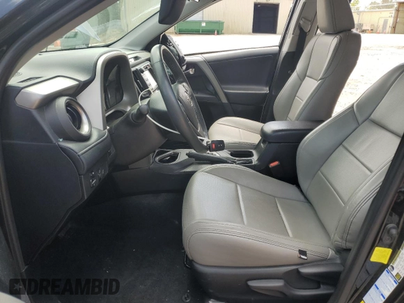 2018 Toyota RAV4 XLE with VIN 2T3RFREV7JW697470, listed as a Copart auction lot 52192305 with 109,420 mi miles and Salvage Title. Bid and sale history available at carsss.com. Image 7.