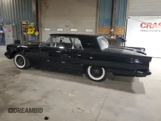 1960 Ford Thunderbird with VIN 0Y71Y188635, listed as a Copart auction lot 49905725 with 1,414 mi miles and Salvage Title. Bid and sale history available at DreamBid. Image 2.