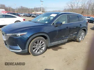 2021 Mazda CX-9 Grand Touring with VIN JM3TCBDY7M0540359, listed as a IAAI auction lot 41711366 with 47,391 mi miles and . Bid and sale history available at carsss.com. Image 2.