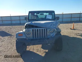 2001 Jeep Wrangler Sport with VIN 1J4FA49S91P324912, listed as a IAAI auction lot 41261214 with 260,299 mi miles. Bid and sale history available at carsss.com. Image 12.