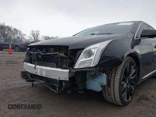 2014 Cadillac XTS Platinum with VIN 2G61W5S84E9291640, listed as a IAAI auction lot 41877867 with 100,462 mi miles and . Bid and sale history available at DreamBid. Image 6.