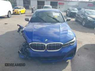 2020 BMW 3 Series M340i xDrive with VIN WBA5U9C00LA379345, listed as a IAAI auction lot 41256225 with 57,856 mi miles and . Bid and sale history available at DreamBid. Image 12.