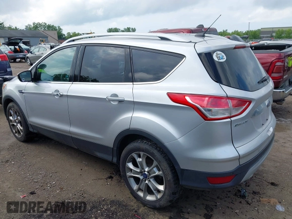2016 Ford Escape Titanium with VIN 1FMCU9J95GUB93585, listed as a IAAI auction lot 42614106 with 124,465 mi miles and . Bid and sale history available at DreamBid. Image 14.